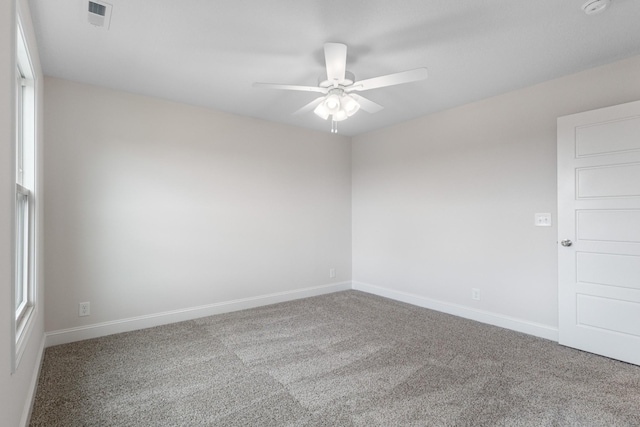 1013 Cherry Acres Dr, Clarksville, TN 37042 - empty room featuring carpet flooring, a ceiling fan, and baseboards