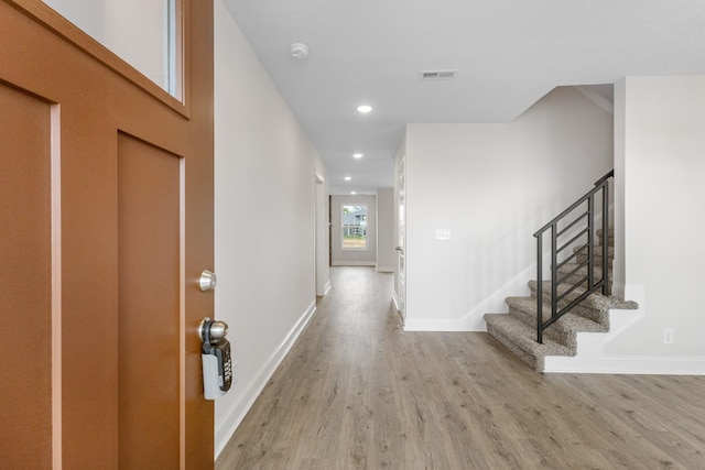 1013 Cherry Acres Dr, Clarksville, TN 37042 - foyer featuring light wood-type flooring, recessed lighting, baseboards, and stairs