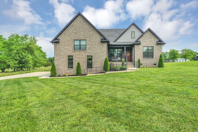 1006 Twilight Dr, Castalian Springs, TN 37031 - view of front of property with brick siding, crawl space, a front yard, and board and batten siding