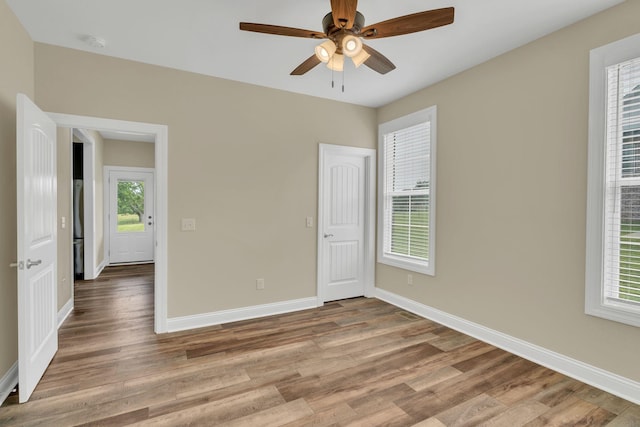 1006 Twilight Dr, Castalian Springs, TN 37031 - empty room featuring wood finished floors, baseboards, and ceiling fan