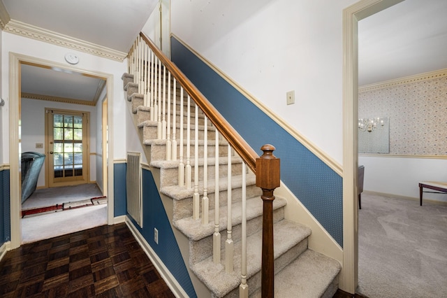 412 Benton Ln, Franklin, TN 37067 - staircase featuring a wainscoted wall, crown molding, carpet flooring, a chandelier, and baseboards