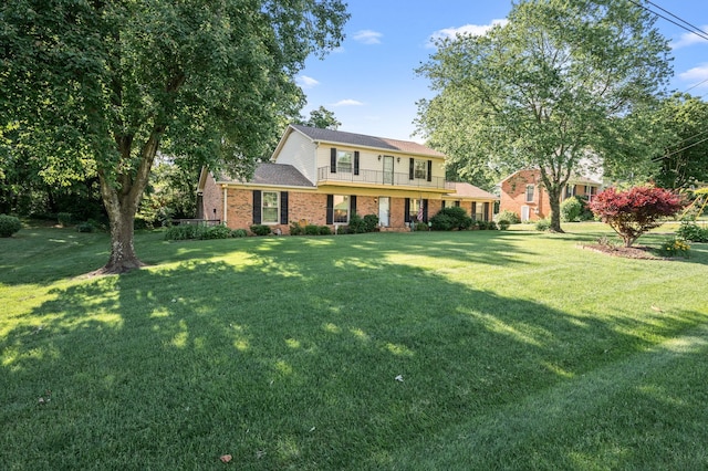 412 Benton Ln, Franklin, TN 37067 - view of front of home featuring a front lawn, brick siding, and a balcony
