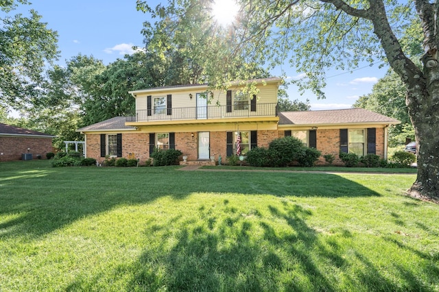 412 Benton Ln, Franklin, TN 37067 - traditional-style home featuring a balcony, brick siding, and a front yard