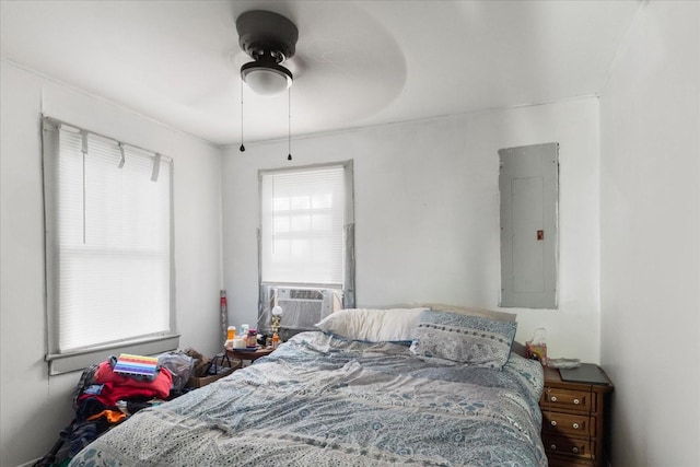 525 Maple St, Lewisburg, TN 37091 - bedroom with electric panel, cooling unit, and ceiling fan