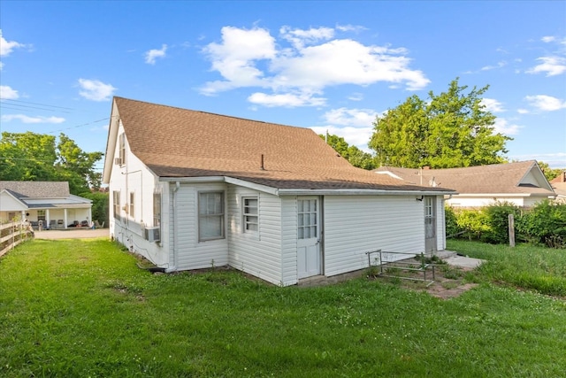 525 Maple St, Lewisburg, TN 37091 - back of property with a yard and a shingled roof