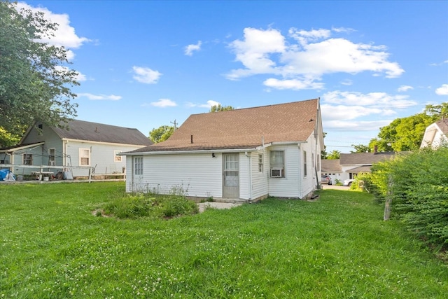 525 Maple St, Lewisburg, TN 37091 - back of house with a lawn and cooling unit