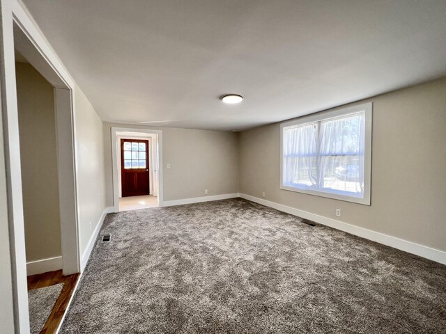 715 Hunt St, Winchester, TN 37398 - spare room featuring baseboards and carpet