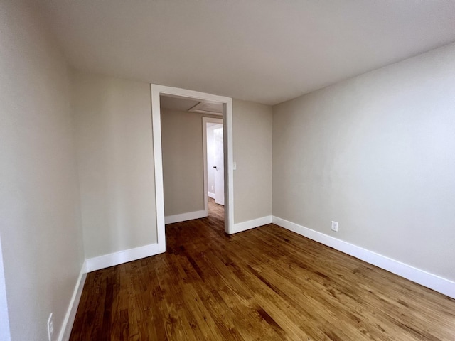 715 Hunt St, Winchester, TN 37398 - spare room featuring dark wood-style flooring and baseboards