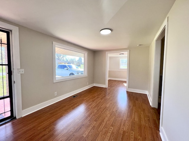 715 Hunt St, Winchester, TN 37398 - empty room with wood finished floors and baseboards