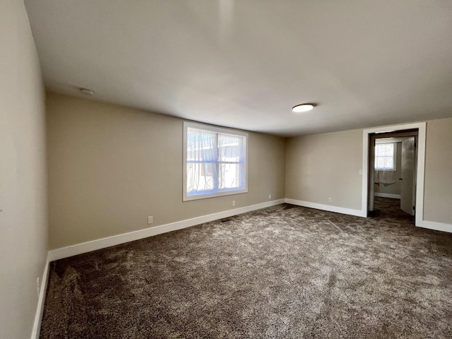 715 Hunt St, Winchester, TN 37398 - spare room with dark carpet, baseboards, and a smoke detector