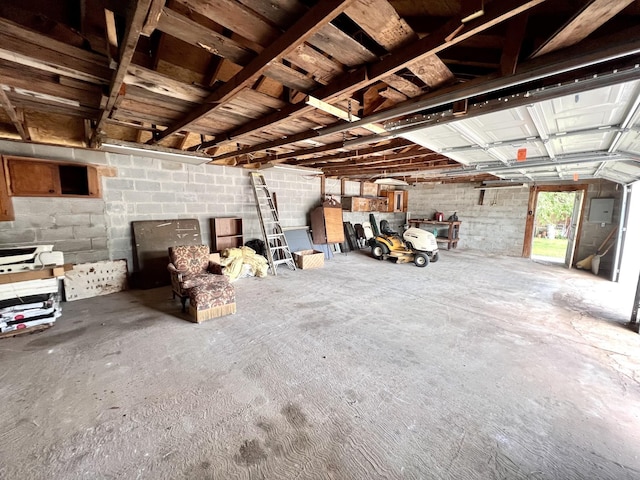 715 Hunt St, Winchester, TN 37398 - garage featuring concrete block wall and electric panel