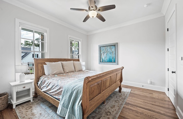 6690 Hastings Ln, Franklin, TN 37069 - bedroom featuring wood finished floors, baseboards, ornamental molding, and ceiling fan