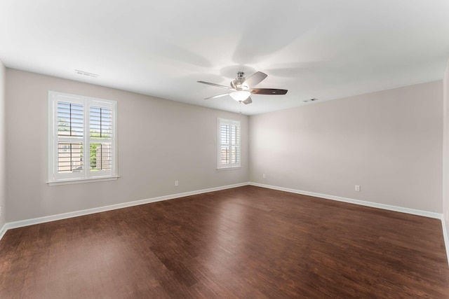 1205 Riverbirch Way, Hermitage, TN 37076 - spare room featuring ceiling fan, dark wood-style floors, and baseboards