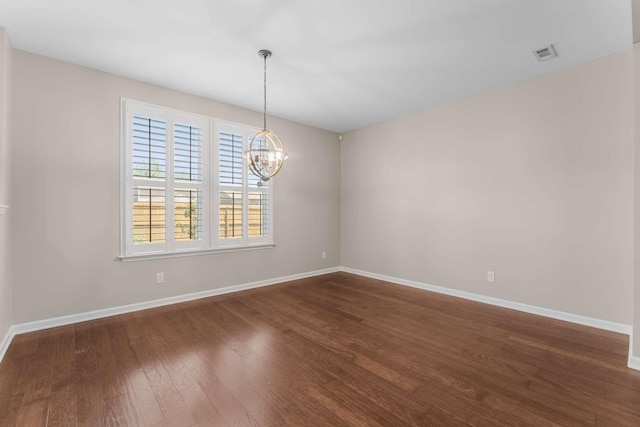 1205 Riverbirch Way, Hermitage, TN 37076 - unfurnished room featuring a chandelier, dark wood-style flooring, and baseboards