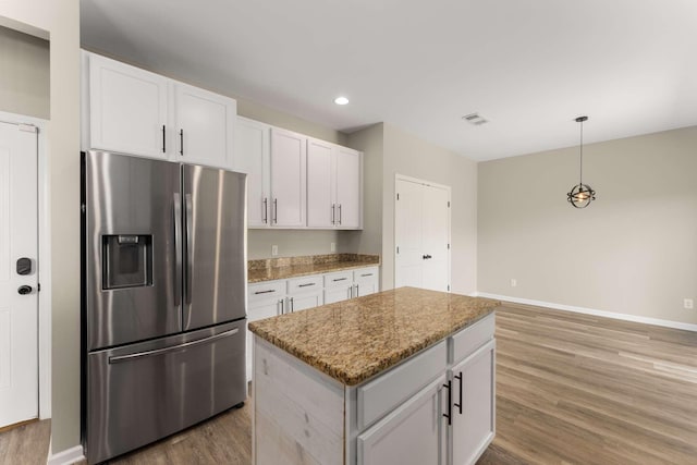 1205 Riverbirch Way, Hermitage, TN 37076 - kitchen featuring stainless steel fridge, light wood-style floors, baseboards, light stone counters, and recessed lighting