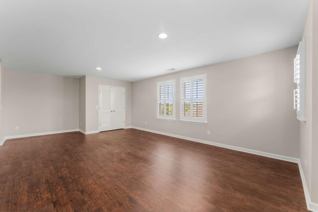 1205 Riverbirch Way, Hermitage, TN 37076 - spare room with baseboards, dark wood-type flooring, and recessed lighting