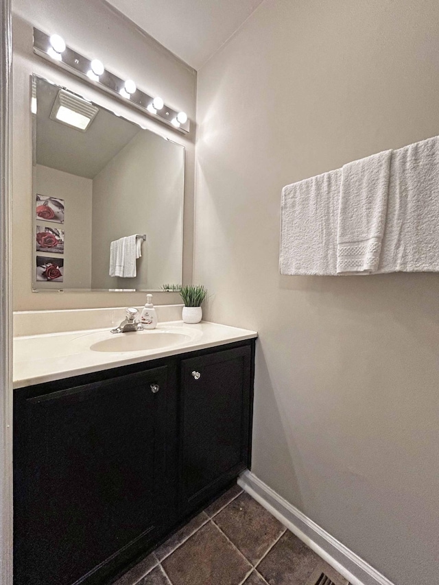 305 Wildwood Dr, Smyrna, TN 37167 - bathroom featuring vanity, tile patterned floors, and baseboards