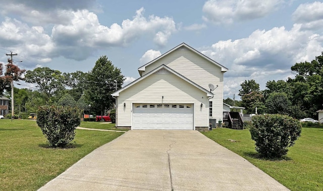 305 Wildwood Dr, Smyrna, TN 37167 - view of property exterior featuring a lawn and concrete driveway