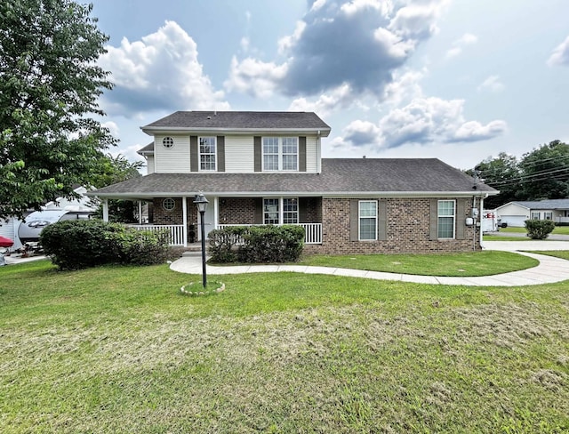 305 Wildwood Dr, Smyrna, TN 37167 - view of front of property with covered porch, a front lawn, brick siding, and roof with shingles