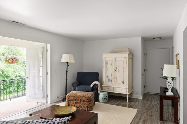 5025 Hillsboro Pike Unit 24K, Nashville, TN 37215 - living area featuring healthy amount of natural light, wood finished floors, and baseboards