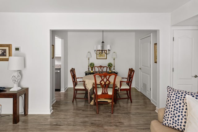 5025 Hillsboro Pike Unit 24K, Nashville, TN 37215 - dining space with a chandelier, dark wood finished floors, and baseboards