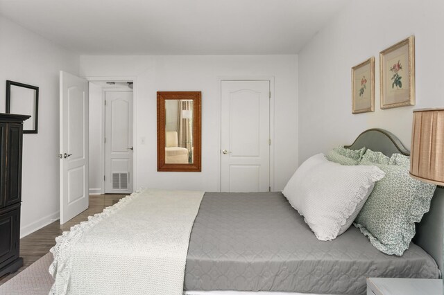 5025 Hillsboro Pike Unit 24K, Nashville, TN 37215 - bedroom with dark wood-type flooring