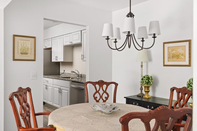 5025 Hillsboro Pike Unit 24K, Nashville, TN 37215 - dining space featuring a chandelier and wood finished floors