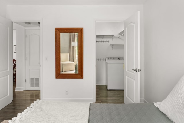 5025 Hillsboro Pike Unit 24K, Nashville, TN 37215 - bedroom with washer / dryer, wood finished floors, a spacious closet, baseboards, and a closet