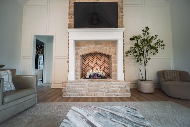1465 Smith Rd, Lebanon, TN 37087 - living area featuring a decorative wall, wood finished floors, and a lit fireplace