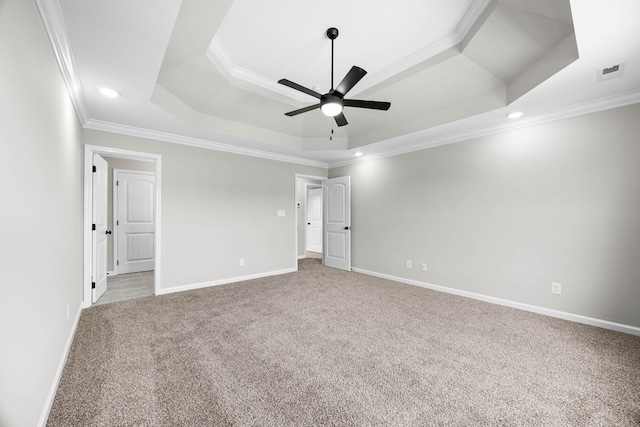 2578 Rafiki Dr, Clarksville, TN 37042 - spare room featuring crown molding, a tray ceiling, ceiling fan, carpet flooring, and baseboards