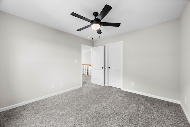 2578 Rafiki Dr, Clarksville, TN 37042 - unfurnished bedroom featuring carpet flooring, baseboards, and a ceiling fan