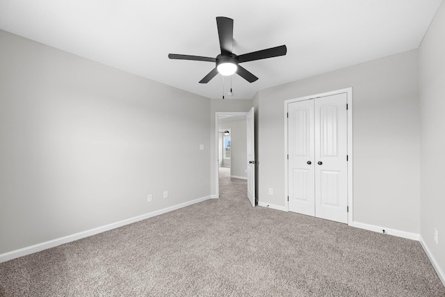2578 Rafiki Dr, Clarksville, TN 37042 - unfurnished bedroom featuring carpet floors, baseboards, a closet, and ceiling fan