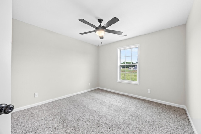 2578 Rafiki Dr, Clarksville, TN 37042 - spare room featuring carpet, baseboards, and ceiling fan