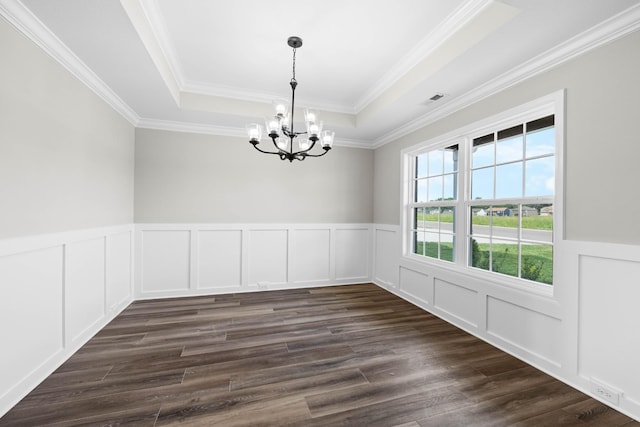 2578 Rafiki Dr, Clarksville, TN 37042 - spare room with a tray ceiling, a chandelier, dark wood finished floors, a decorative wall, and ornamental molding