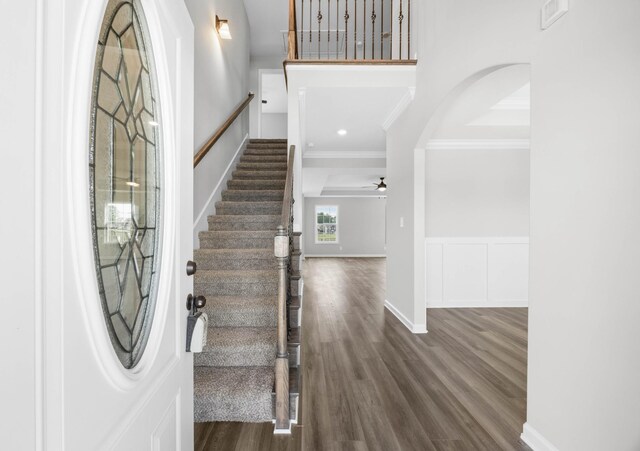 2578 Rafiki Dr, Clarksville, TN 37042 - foyer entrance featuring ornamental molding, wood finished floors, stairway, a ceiling fan, and baseboards