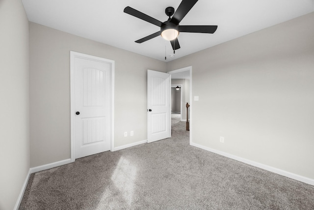 2578 Rafiki Dr, Clarksville, TN 37042 - unfurnished bedroom featuring carpet floors, baseboards, and a ceiling fan