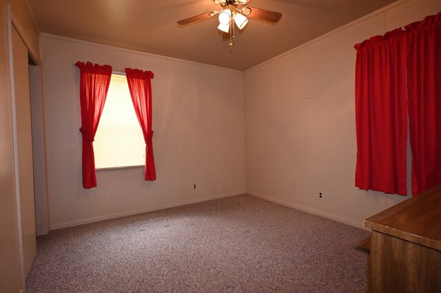 148 W Fourth Ave, Lobelville, TN 37097 - empty room featuring carpet floors, a ceiling fan, baseboards, and ornamental molding