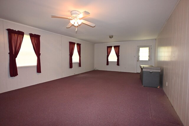 148 W Fourth Ave, Lobelville, TN 37097 - empty room featuring a ceiling fan and carpet
