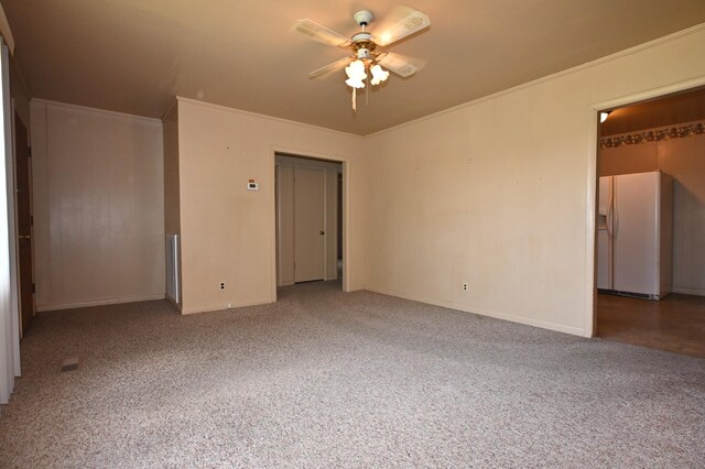 148 W Fourth Ave, Lobelville, TN 37097 - unfurnished room featuring ceiling fan, carpet floors, baseboards, and ornamental molding