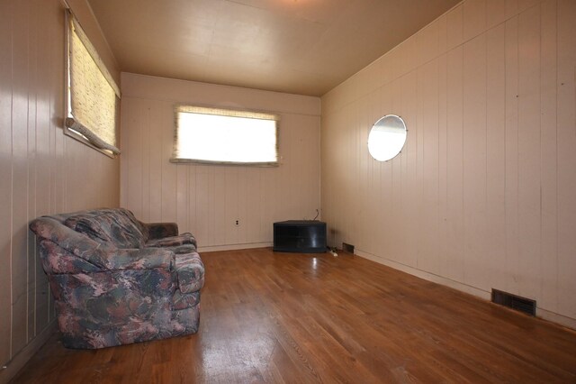 148 W Fourth Ave, Lobelville, TN 37097 - sitting room with wood finished floors