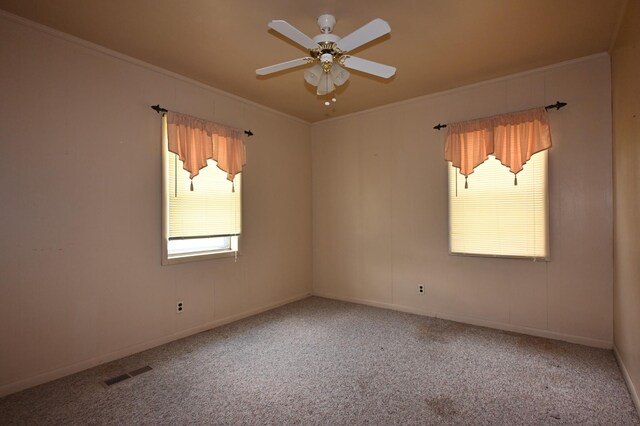 148 W Fourth Ave, Lobelville, TN 37097 - carpeted spare room featuring ornamental molding and ceiling fan