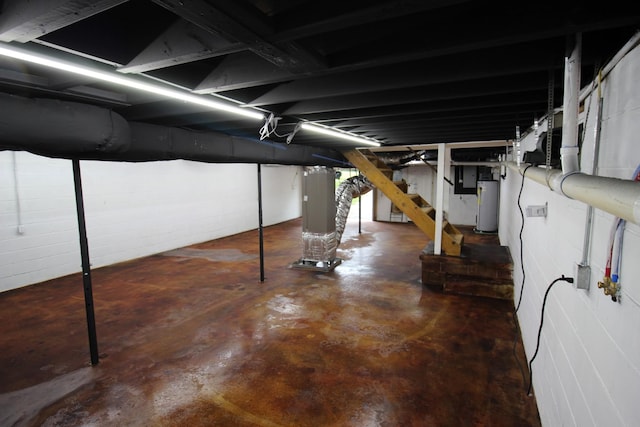 762 Austin Bottom Rd, Baxter, TN 38544 - unfinished basement featuring gas water heater