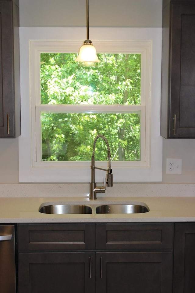 762 Austin Bottom Rd, Baxter, TN 38544 - kitchen featuring a sink, healthy amount of natural light, light countertops, and dishwasher