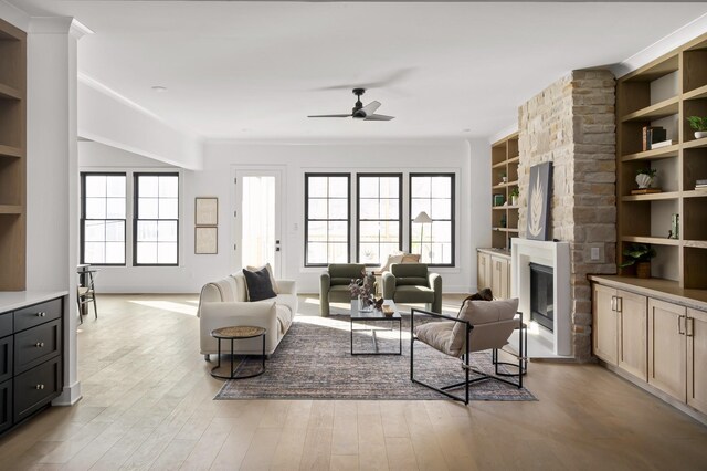 1601 S Observatory Dr Unit C, Nashville, TN 37215 - living area with a fireplace, ceiling fan, built in shelves, and light wood-type flooring