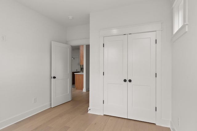 1330 Mcalpine Ave, Nashville, TN 37216 - unfurnished bedroom with light wood-style floors, baseboards, and a closet