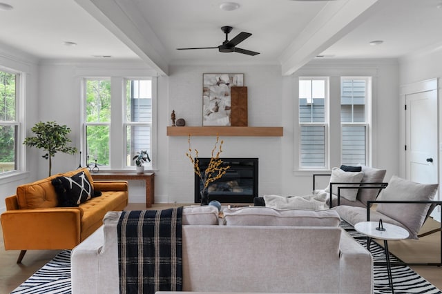 1330 Mcalpine Ave, Nashville, TN 37216 - living area featuring ceiling fan, ornamental molding, wood finished floors, a glass covered fireplace, and baseboards