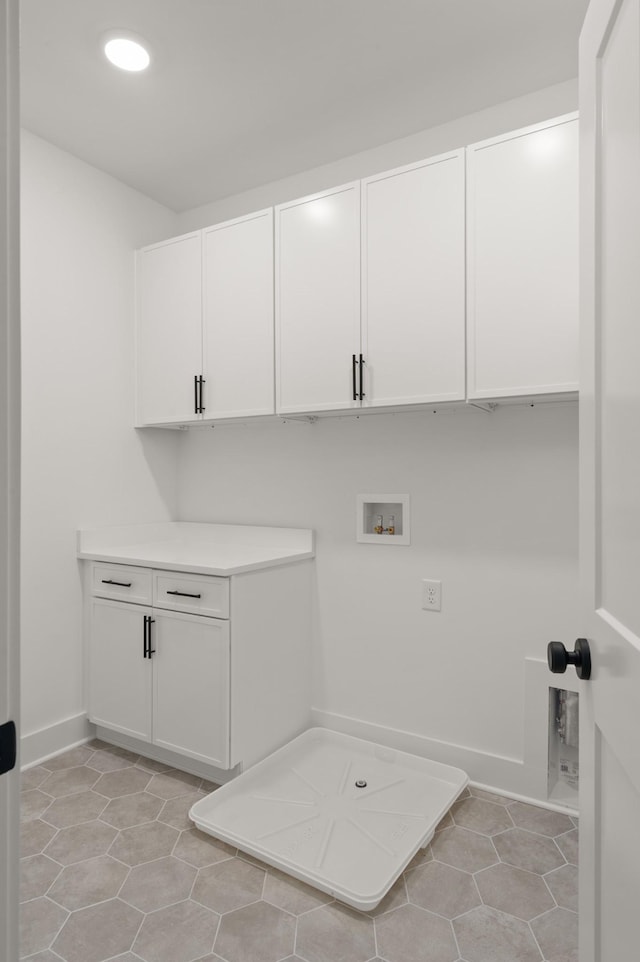 1330 Mcalpine Ave, Nashville, TN 37216 - laundry room featuring cabinet space, hookup for a washing machine, light tile patterned floors, recessed lighting, and baseboards