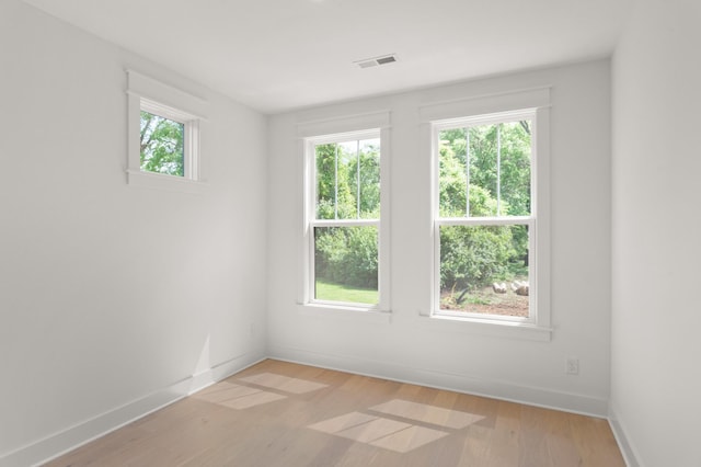 1330 Mcalpine Ave, Nashville, TN 37216 - spare room with healthy amount of natural light, light wood-style flooring, and baseboards