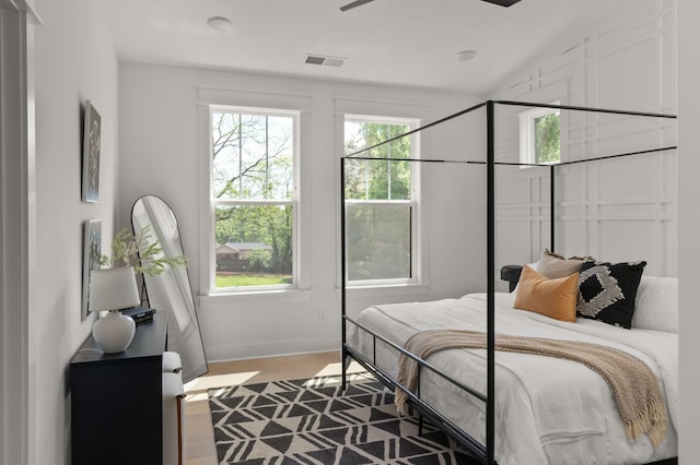 1330 Mcalpine Ave, Nashville, TN 37216 - bedroom with baseboards, vaulted ceiling, and wood finished floors