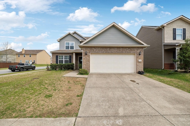390 Owl Dr, Lebanon, TN 37087 - traditional-style house featuring brick siding, an attached garage, driveway, and a front yard